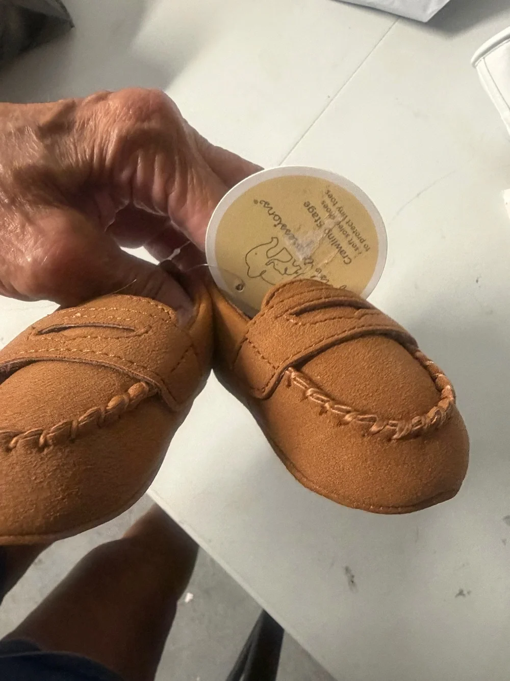First impressions, baby suede tan loafers flew with tags